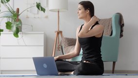 Woman greet yoga coach online on laptop, waving with smile Spbi. Positive 20s fit female