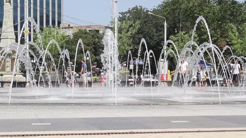 Krasnodar, Krasnodar Krai, Russia - July 28, 2013: People relax at the city fountain 