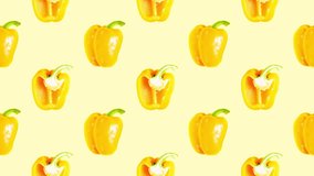 Stop motion animation. Juicy yellow peppers, whole and cut in half, alternate against a yellow background. Seamless video
