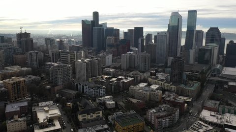 Cinematic aerial - drone footage of Capitol Hill, Pike - Pine, First Hill, Central Seattle, Washington State Convention Center downtown with skyscrapers in the morning in King County, Washington State