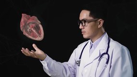 Asian Doctor Holding Digital X-Ray Of Human Heart
 - Powered by Shutterstock - Get 15% off with code: PIKWIZARD15