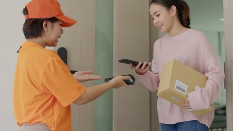 Asia young smile happy woman people receive parcel postal from e-commerce online shop store use tapping cashless wifi qr code nfc bill scan app smart pos device reader in city life home contactless.