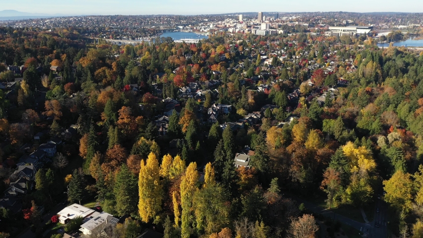 Aerial - drone footage of the University of Washington, UW Botanic Gardens, Washington Park Arboretum, Montlake, Broadmoor, Madison Park, Madison Valley, surrounding suburbs in King County, Washington