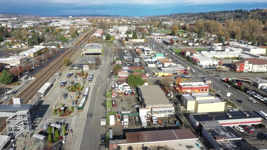 Aerial clip of Kent Station, a shopping area downtown Kent in the Green River Valley near East Hill, Scenic Hill, Auburn, Renton, Federal Way, all suburbs of Seattle, King County Washington