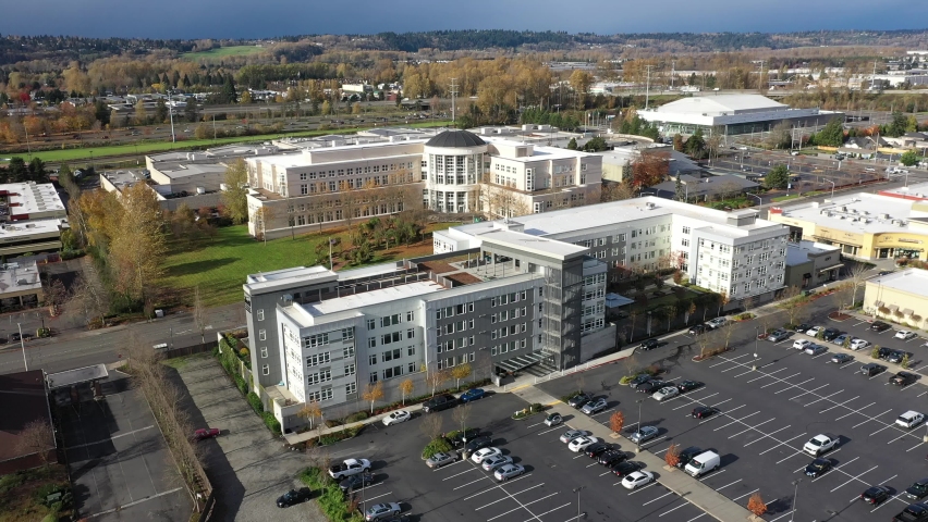 Aerial - drone footage of the King County Superior Court in Kent Station, a shopping area downtown Kent in the Green River Valley near East Hill, Scenic Hill, Auburn, Renton, Federal Way, near Seattle