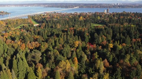 Aerial - drone footage of UW Botanic Gardens, Washington Park Arboretum, Madison Park, Washington Park, Broadmoor, Madison Valley, Lake Washington and surrounding suburbs, in King County, Washington