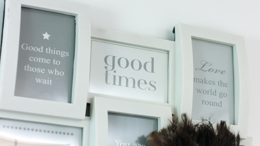 CU Person dusting off pictures, Nottingham, Nottinghamshire, UK