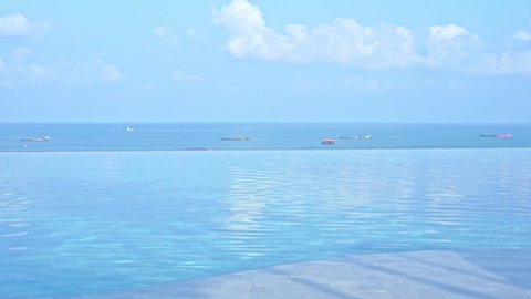 Surface Water From Infinity Swimming Pool, Boats in the Sea Background