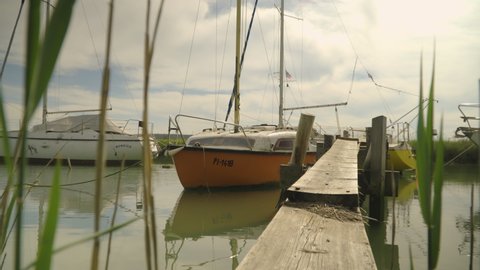 PIRAN, SLOVENIA - MAY 2021:
Small sailboats and boats moored in swamp port.