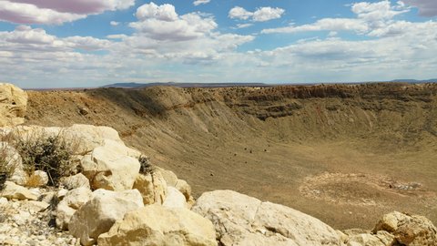 Time lapse pan of prehistoric impact crater in the Southwest desert