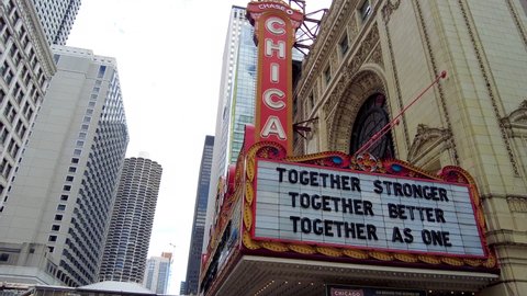 Chicago, IL USA - June 4 2021: Chicago Theater Marquee in early summer 2021: "Together Stronger | Together Better | Together as One" heralding the reopening of Illinois and return to in-person events