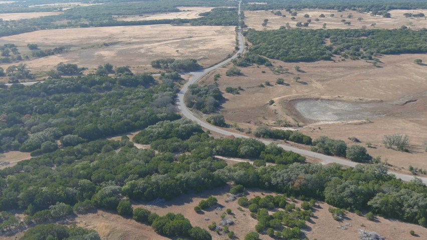 Vehicle on Rural Road in Federicksburgh, Texas