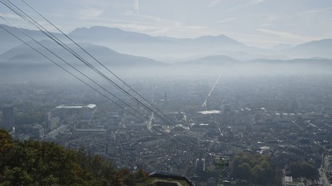 view of Grenoble in the heart of the french alps at fall's, from la Bastille.