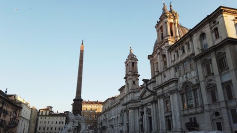 Europe, Italy  June 2021 -  Piazza Navona in  Rome - tourists arrive to visit sightseeing after finish of lockdown due covid-19 Coronavirus - Zeus statue and obelisk