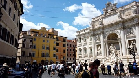 Europe, Italy June 2021 - The Trevi Fountain is a  Baroque fountain in the Trevi district in Rome - tourist after visiting sightseeing  after finish of lockdown due Covid-19 Coronavirus 