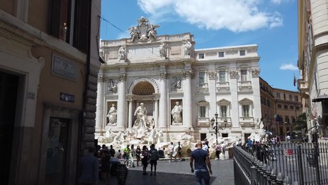 Europe, Italy June 2021 - The Trevi Fountain is a  Baroque fountain in the Trevi district in Rome - tourist after visiting sightseeing  after finish of lockdown due Covid-19 Coronavirus