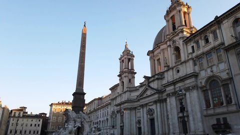 Europe, Italy  June 2021 -  Piazza Navona in  Rome - tourists arrive to visit sightseeing after finish of lockdown due covid-19 Coronavirus - Zeus statue and obelisk