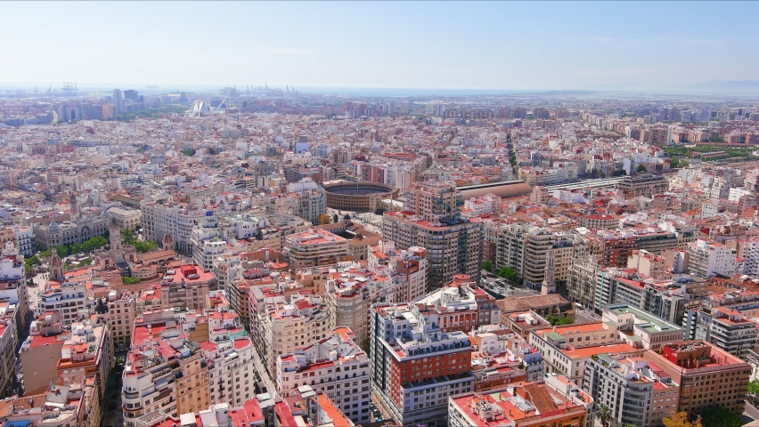 Valencia: Aerial view of famous city in Spain, corrida arena Bullring of Valencia (Plaça de Bous de València) in historic centre of city - landscape panorama of Europe from above Royalty-Free Stock Footage #1073909054