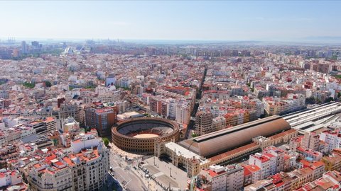 Valencia: Aerial view of famous city in Spain, corrida arena Bullring of Valencia (Plaça de Bous de València) in historic centre of city - landscape panorama of Europe from above