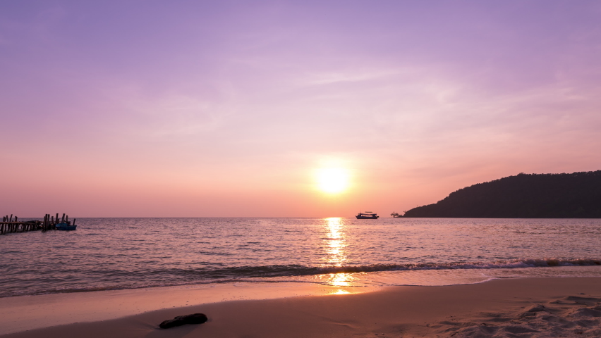 Sunset to milky way timelapse over the ocean on idyllic island beach pan up | Shutterstock HD Video #1073920421
