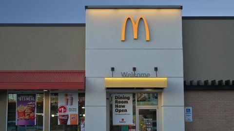 Green Valley , Arizona , United States - 05 29 2021: McDonald's fast food restaurant Dining Room Now Open sign