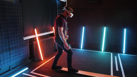 Futuristic oculus rift glasses VR studio. Technology visor simulation. Augmented eyewear headset. Virtual reality helmet gadget gaming. AR Quest goggles set. Gamer holding balance in simulator game. Video stock