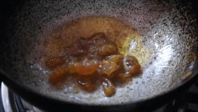 Video of roasting raisin or dried grape in Ghee. It is used for making payasam a south Indian dessert.