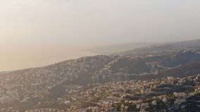 Aerial view of Beirut сapital city of Lebanon. Drone video on sunset  sunrise hilly cityscape with sea in the background.