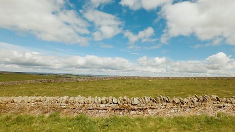 Travelling along Hadrian's Wall, ordered by the namesake Roman emperor in AD 122 in today's Northumberland region, North East England, UK. Hadrian's Wall is a UNESCO World Heritage Site