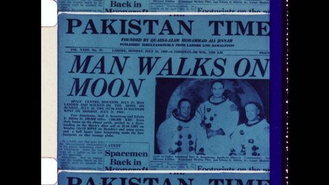 1969, Earth's Moon. International Newspaper Headline: Moon Landing. Neil Armstrong hold Video Camera sends First Images of the Lunar Surface to NASA Mission Control. 4K Overscan of Archival Film Print