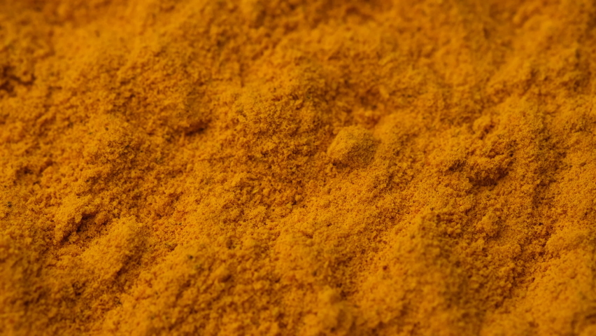 turmeric powder top view, rotate. Condiment or dietary supplement. 4K UHD video Royalty-Free Stock Footage #1073962049