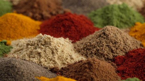 Spice and seasoning. Various Spices and herbs close up. Assortment of Seasonings, Dry colorful condiments. 4K UHD video