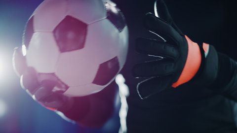 Professional Anonymous Soccer Goalkeeper Holding Fooltabll Ball. Star Footballer Goalie Accepting the Challenge, Determined, Confident in Winning Championship. Dramatic, Stylsih, Cinematic. Close-up