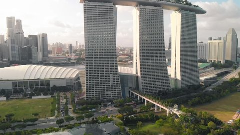 Aerial front view of Marina Bay Sands with skyscrapers and city landscape on background. Singapore
