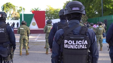 Rear View Of police man in mexico, mexican police officer