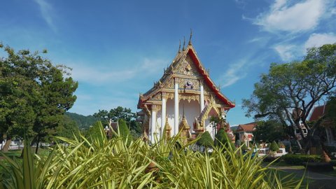 Wat Chalong temple Phuket,Thailand. Beautiful buddhist local town popular famous landmark holiday vacation. Most important Thai tourists pay respects monks buddha golden statues. 4k copy space 2022.