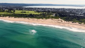 Drone aerial pan towards Shelly Beach Golf Course overlooking Pacific Ocean Tourism Central Coast NSW Australia 3840x2160 4K