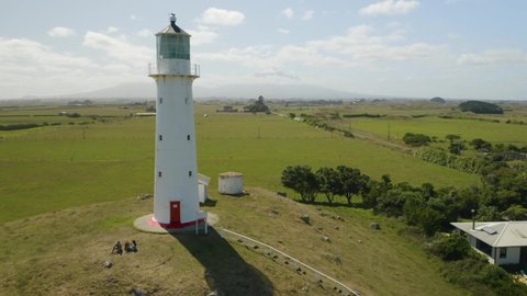 Aerial View of Cape Egmont Lighthouse with Mount Taranaki in Background