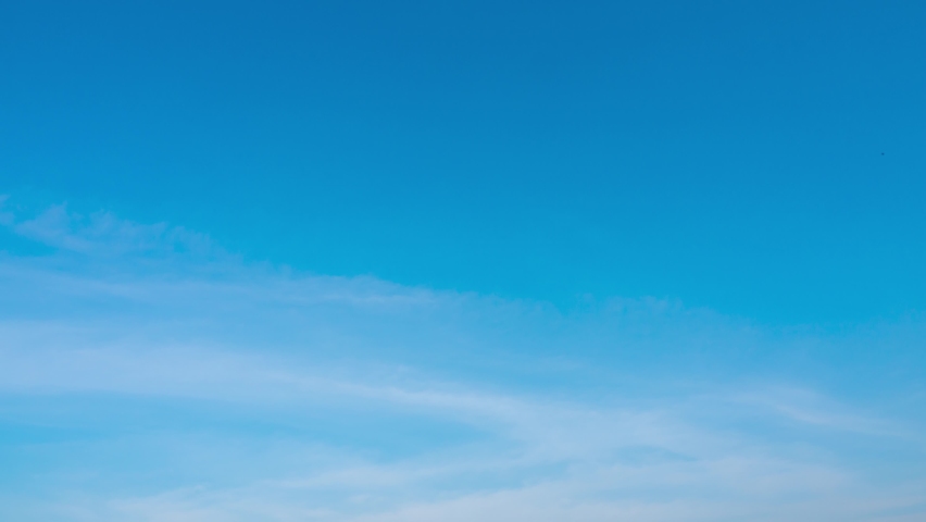 Pastel blue sky wispy white clouds timelapse footage. clear sunny skyscraper. Good weather in soft blue color space. High heavenly nature skylight summer season atmosphere. B roll 4k video background.