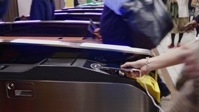 Passengers are going through a tourniquet to the platform. Entrance to the railway station through the turnstile, Tokyo, Japan. - Powered by Shutterstock - Get 15% off with code: PIKWIZARD15