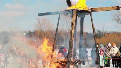 Gomel, Belarus - March 13, 2021: Burning Effigies Straw Maslenitsa In Fire Flame On Traditional National Holiday Dedicated To Approach Of Spring - Slavic Celebration Shrovetide. 4K