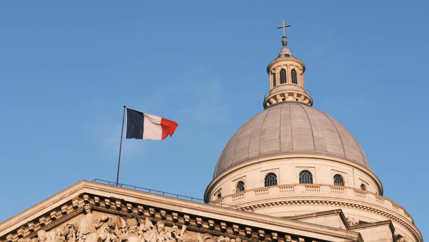 French flag waving in the air on the Pantheon with cupola in Paris blue sky sunny day Royalty-Free Stock Footage #1074008177