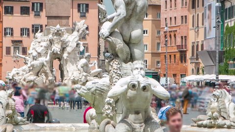 The fountain of Neptune on Navona square timelapse in Rome, Italy. Crowd and old historic buildings