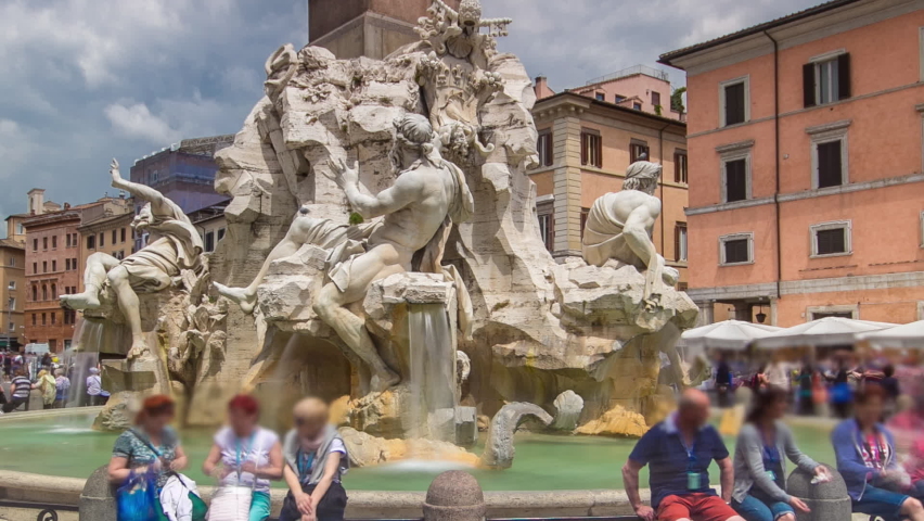 Piazza Navona, the fountain of four rivers timelapse hyperlapse. People sitting around. Cloudy sky. Italy, Rome | Shutterstock HD Video #1074010715