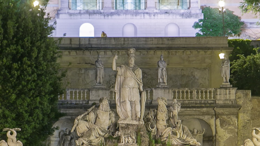 illuminated fountain of Dea Roma night timelapse in Piazza del Popolo with Pincio terrace in the background