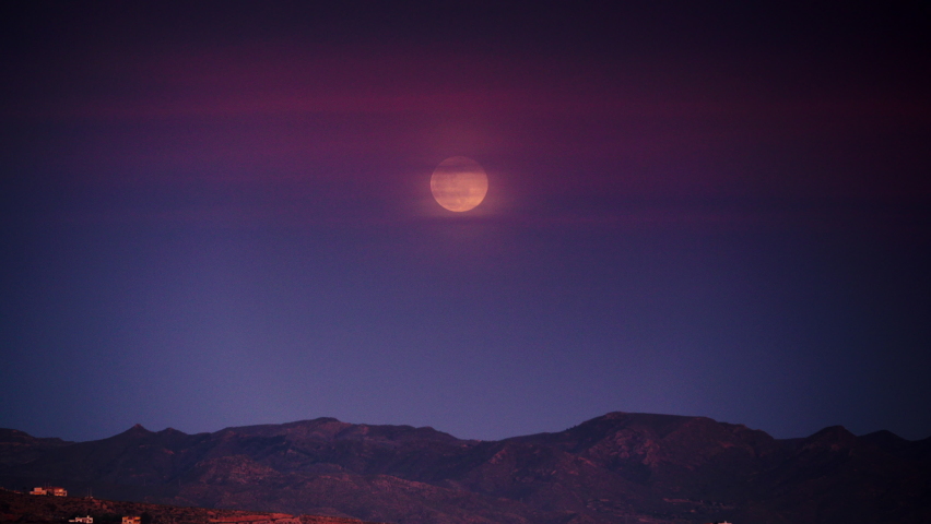 Moon over mountains landscape, Sierra de las Moreras in Murcia, Mediterranean region in Spain