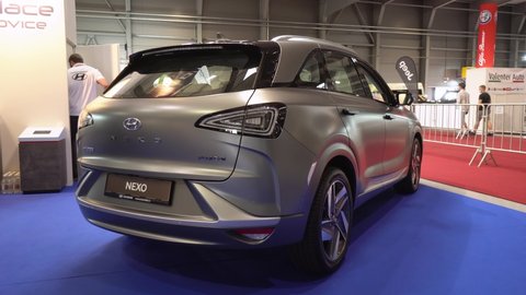 PRAGUE, CZECH REPUBLIC - AUGUST 28, 2020: Rear view of a silver hydrogen-powered Hyundai Nexo at a car exhibition, two cars in the background