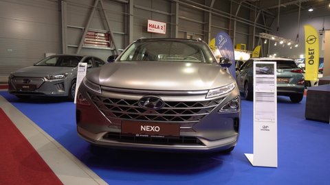 PRAGUE, CZECH REPUBLIC - AUGUST 28, 2020: Front view of a silver Hyundai Nexo at a car exhibition, two cars in the background