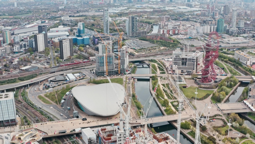 Dolly back drone shot from London aquatics centre Olympic park stratford | Shutterstock HD Video #1074049778