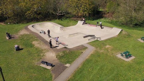 Yorkshire , United Kingdom (UK) - 04 07 2021: skateboarders practicing at Dearne Valley park 
